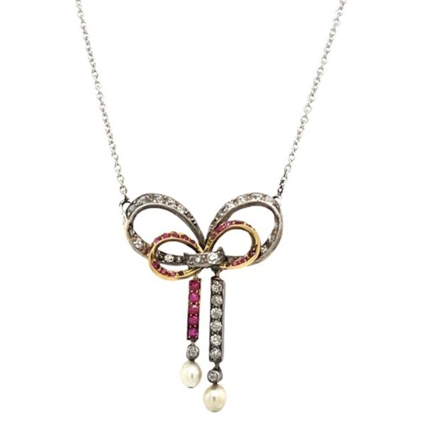 Vintage Diamond & Ruby Bow Pendant Suspended from 18"/16" 14ct Gold Chain