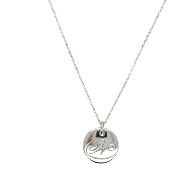 Tiffany & Co. Notes Letter 'N' Round Pendant Necklace in Silver