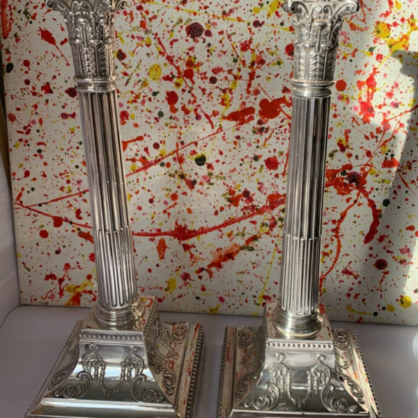 Pair of Sterling Silver Candlesticks by James Dixon & Sons Ltd in 1909